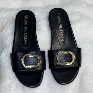 Stuart Weitzman Black Sandals with Gold Detail